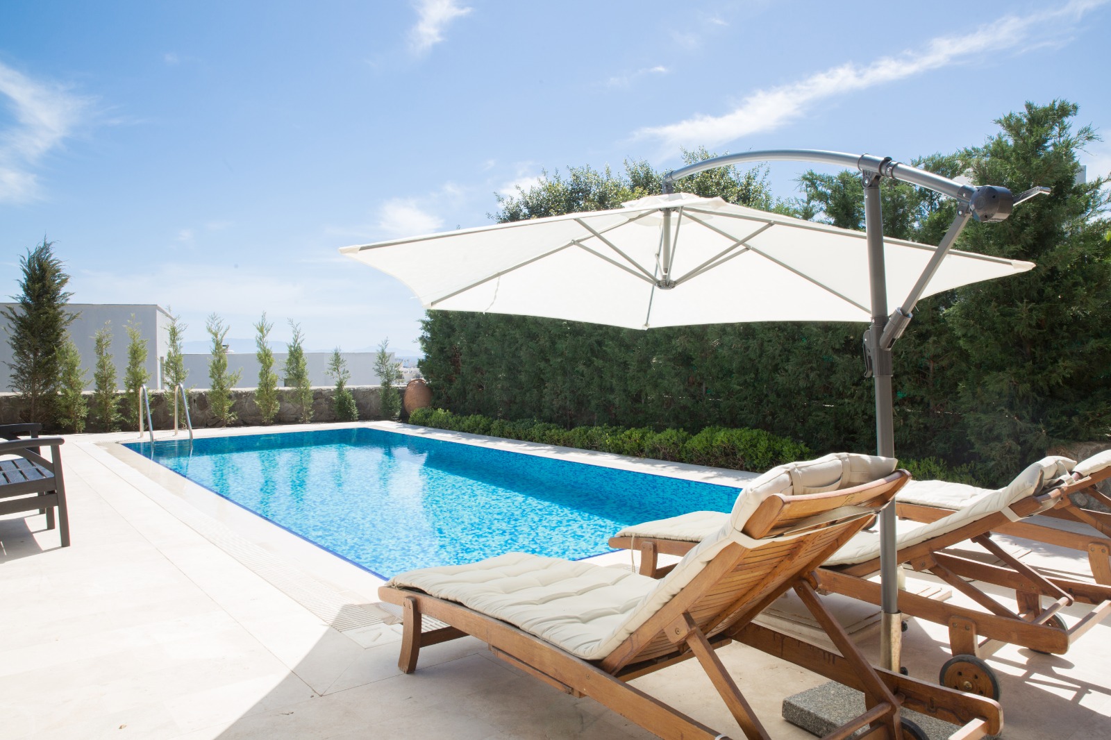 Villa Stella — private pool with ancient stone wall